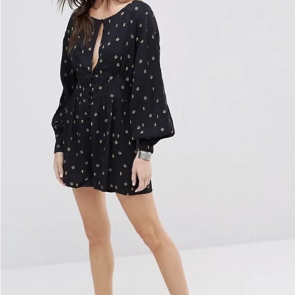 Free people love Grows floral  Romper sz M nwt